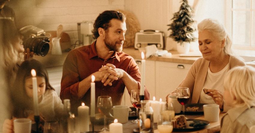 Family Traditions - People Sitting Beside Table