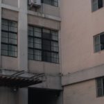 Mindfulness Corner - A person sitting on a bench outside of a building